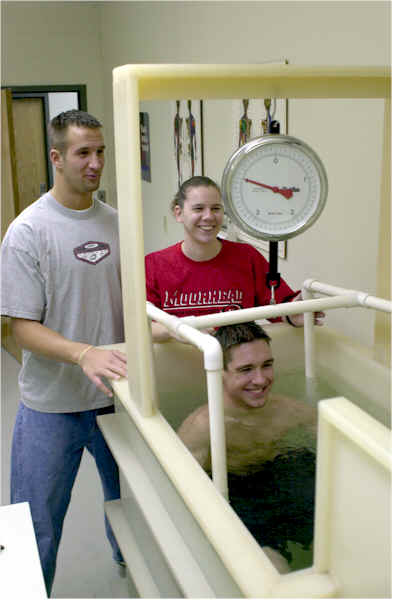 Students in Weight Room demonstrating Hydrostatic Weighing